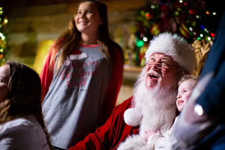 a person holding a stuffed animal