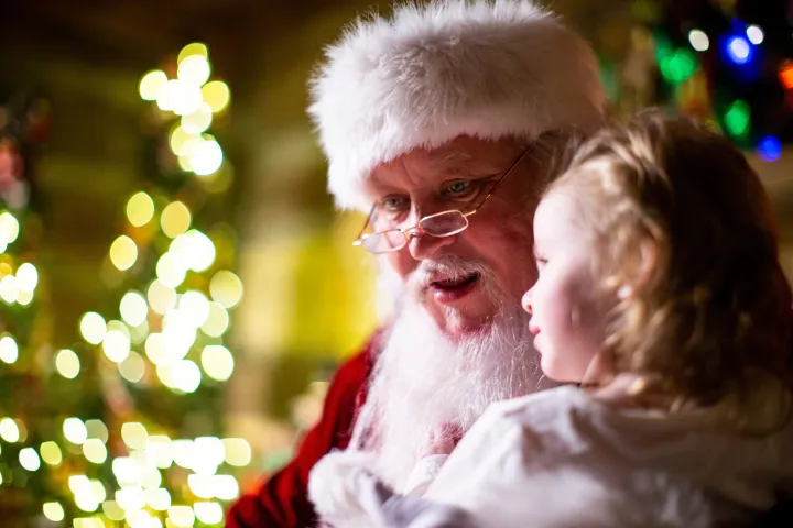 a man and a woman looking at the camera