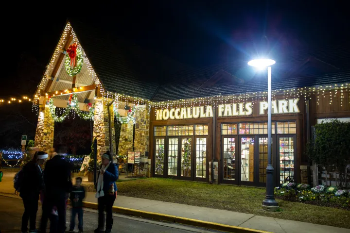 a group of people standing in front of a building