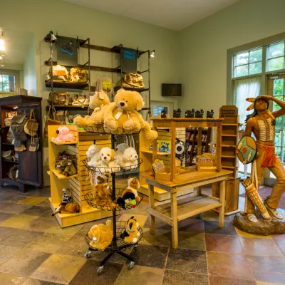 a person sitting on display in a store